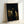 Classical portrait print depicting a solitary scholar in luxurious drapery beside a bust of Homer, bathed in dramatic golden light against dark backgrounds.