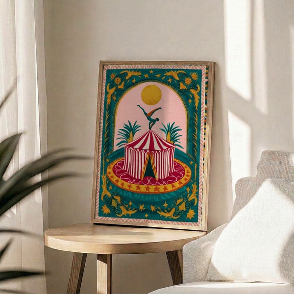 Whimsical Art Nouveau-inspired circus poster showcasing an acrobat in performance with golden sun, crescent moon, and swaying palms framed on a wall.