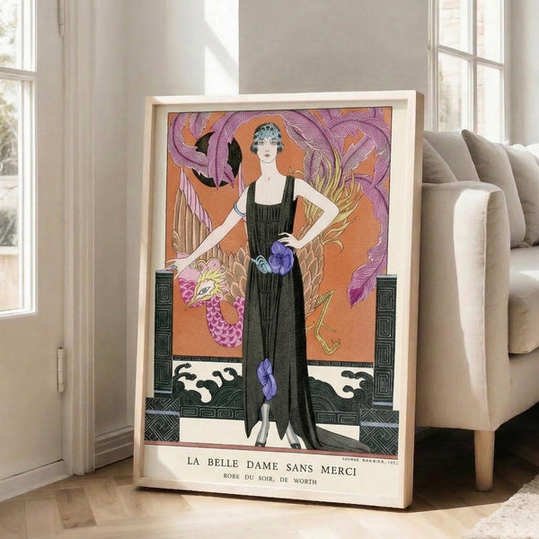 Framed Art Deco poster showing a poised woman in a flowing gown with intertwined purple dragon and leafy designs in terracotta, black, and pale gold palette.