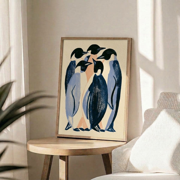 Elegant Art Deco poster of huddled penguins rendered in muted periwinkle, navy, cream, and peach with gold details for contemporary wall decor.