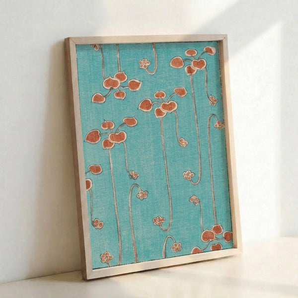 Framed art print displaying Art Nouveau clover design with flowing lines in muted turquoise and terracotta hues on cream background.