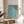 Japandi wall art print displaying nature-inspired flowers and foliage in turquoise, terracotta, and neutral tones.