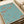 Vintage Japandi botanical art displaying stylized plant stems and blooms in soft turquoise, terracotta, and neutral palette.
