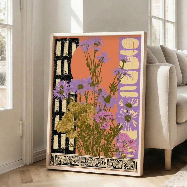 Framed botanical art print featuring whimsical retro-style wildflowers in orange, purple, and cream with black linework and green foliage.