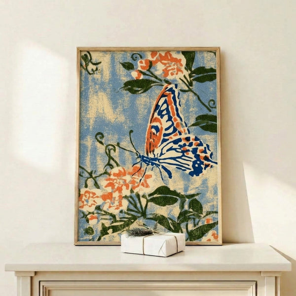 Vintage-style art print showing a serene monarch butterfly amid botanical elements including soft blue blooms and lush green leaves, rendered in classical Art Nouveau design.
