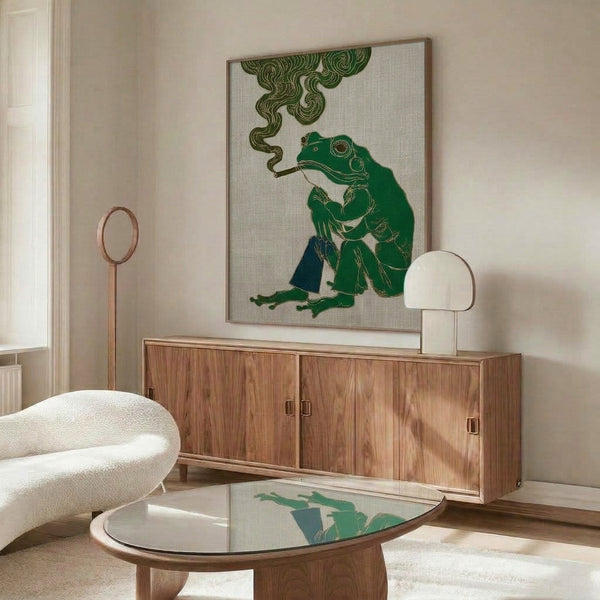 Dark academia wall art showcasing a surreal, elegantly dressed frog with a smoking pipe, executed in delicate Art Nouveau linework with a sophisticated palette of olive, cream, and metallic gold accents.
