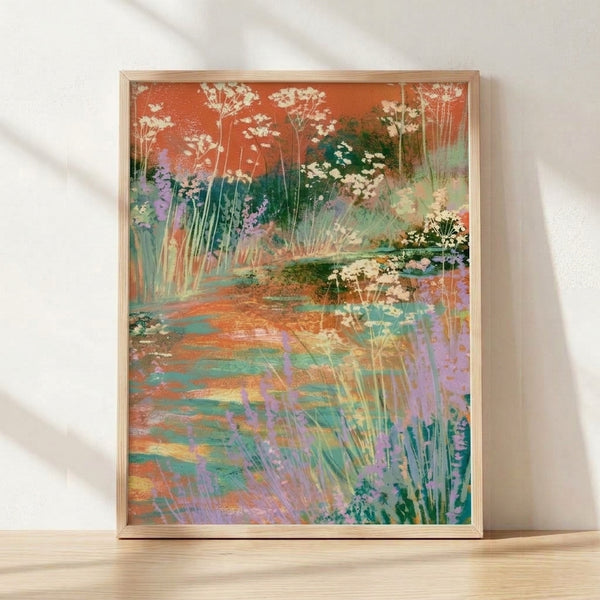 Impressionist-style framed poster depicting a dreamy wildflower garden path with terracotta orange blooms, sage green foliage, and a teal blue stream winding through soft lavender and cream tones.