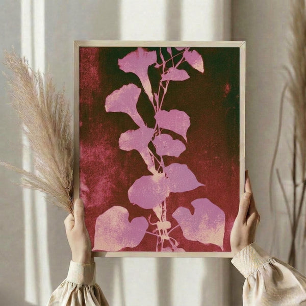 Vintage-inspired botanical wall art with silhouetted leaves in mauve and forest green hues, capturing an elegant, dreamy cottagecore mood through Art Nouveau design.