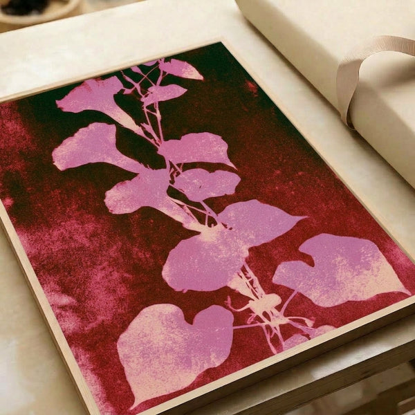 Botanical leaf silhouette art print in soft mauve pink and deep burgundy with forest green accents on cream, blending vintage elegance with contemplative boho charm.