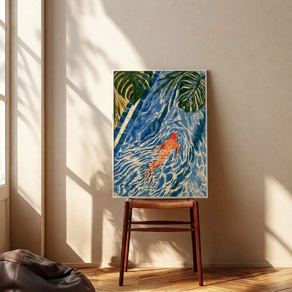 Framed Art Nouveau poster showcasing a swimmer amid tropical botanicals in cerulean blue and coral red, with cream and forest green details creating a sophisticated, relaxing coastal atmosphere.