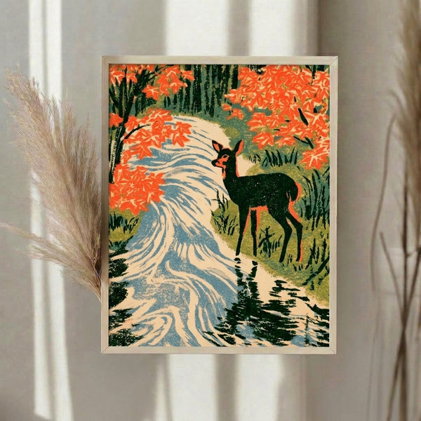 Vintage-style framed poster art depicting a contemplative deer at a woodland stream with seasonal foliage in warm orange and cool blue-green hues, inspired by traditional Japanese aesthetics.