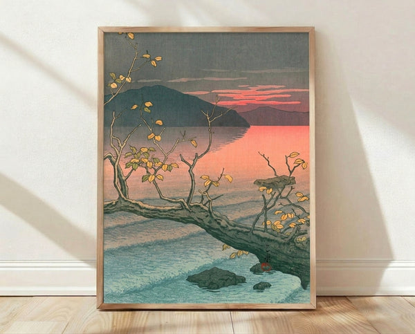 Japanese woodblock print depicting a serene autumn lake at sunset, with layered mountains in charcoal grey, golden trees reflected in deep teal waters, and a coral pink sky creating a contemplative mood.