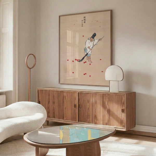 Wabi-sabi style framed poster: minimalist figure sweeping leaves in muted cream, red, and grey tones capturing seasonal tranquility in Japanese woodblock tradition.