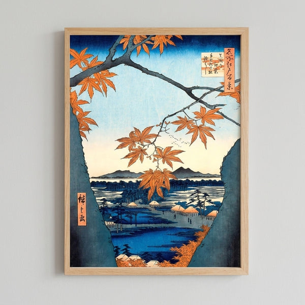 Contemplative Japandi art print depicting a delicate maple tree branch in warm autumn hues overlooking a peaceful village landscape with mountains and water in cool blues and grays.