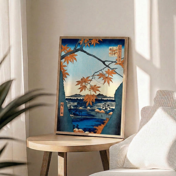 Japandi wall art in traditional woodblock style presenting an elegant autumn maple landscape with deep blue waters, teal accents, and cream-colored foliage across a contemplative mountainous scene.