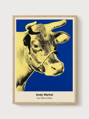 Andy Warhol Cow Yellow On Blue Poster poster in oak frame