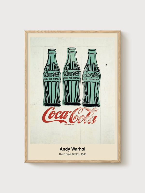 Andy Warhol Three Coke Bottles poster in oak frame