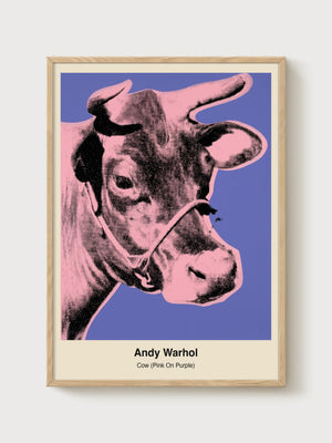Andy Warhol Cow Pink On Purple Poster poster in oak frame