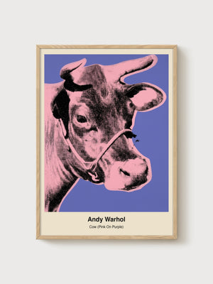 Andy Warhol Cow Pink On Purple Poster poster in oak frame