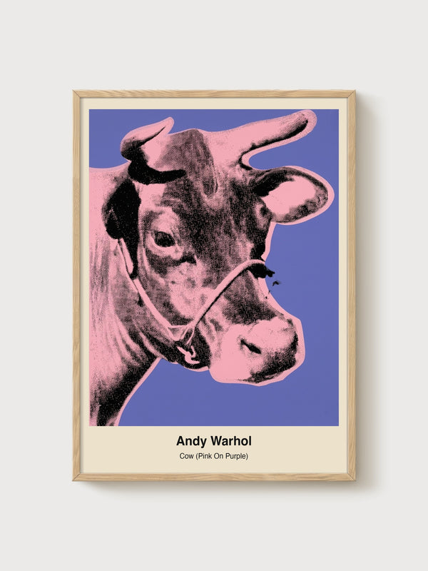 Andy Warhol Cow Pink On Purple Poster poster in oak frame