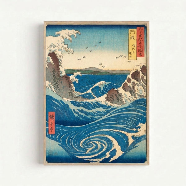Vintage-style seascape woodblock art showing the Awa Naruto whirlpool with churning ocean waves in deep blue, cream-colored foam, and pale yellow sky, framed poster on wall.