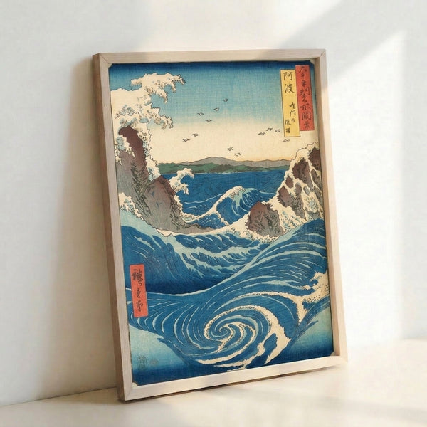 Dramatic ocean scene rendered in traditional Japanese woodblock style: powerful whirlpool in shades of prussian blue and turquoise, rocky coastline, mountain silhouettes, and flying birds creating majestic mood.