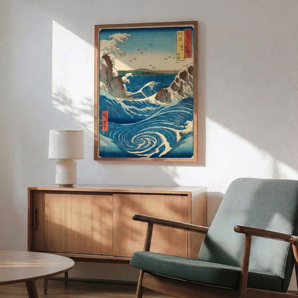 Vintage-inspired Japanese woodblock seascape: majestic swirling whirlpool in prussian blue and turquoise, cream-colored foam and rocks, mountain forms, and birds creating both serene and powerful mood.