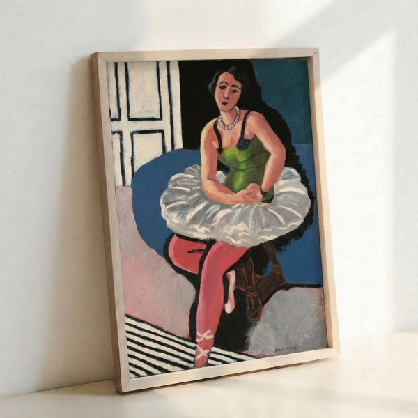Framed wall poster featuring a ballet dancer in repose, captured through bold minimalist linework characteristic of early 20th century modern art.