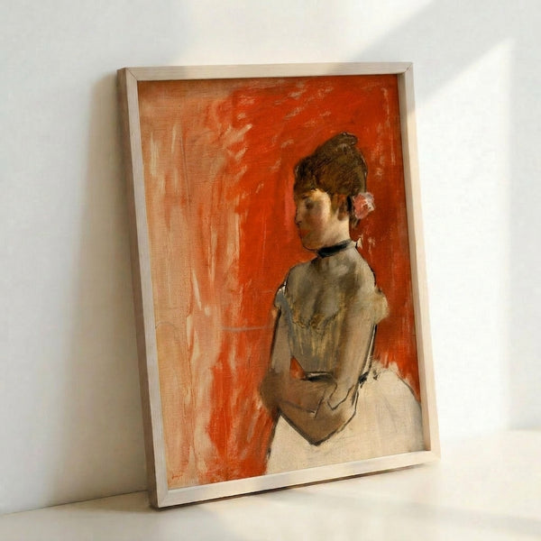 Framed poster of an elegantly posed dancer with arms crossed, painted in muted ochre and cream hues with an artistic, introspective mood.