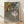 Framed Impressionist ballet poster featuring delicate dancers in soft pastels and muted earth tones, evoking the graceful elegance of classical dance.