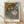 Impressionist ballet scene featuring graceful female dancers on stage, rendered in soft cream, ochre, and black tones with contemplative mood.