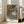 Impressionist poster print showcasing ballet dancers on stage in warm ochre and cream, with touches of soft green and black creating an elegant, graceful composition.