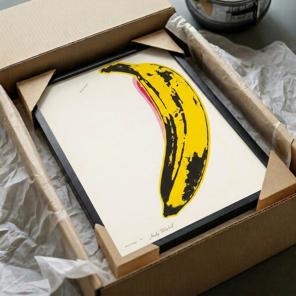 Yellow banana depicted with graphic pop art sensibility, a bold and recognizable modern art print suitable for contemporary wall displays.