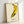 Warhol-inspired banana artwork in striking yellow with black outlines, modern pop art style poster framed on gallery wall.