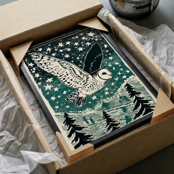 Barn owl framed wall art with a starry forest background, showcasing retro linocut technique in cream, black, and green tones with a tranquil, introspective feeling.