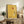 Minimalist geometric art print in the Bauhaus tradition, combining abstract shapes in a striking palette of yellow, red, cream, charcoal, and blue.
