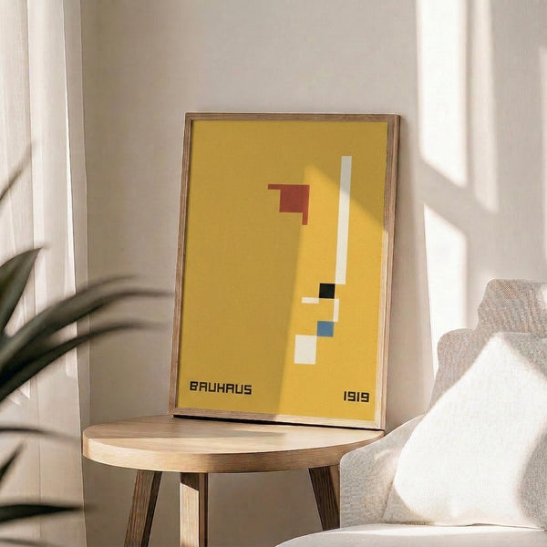 Framed constructivist composition with stark geometric abstraction in golden yellow, terracotta, cream, black, and steel blue, inspired by 1919 Bauhaus design.