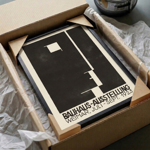 Geometric wall art print in black and cream inspired by 1923 Bauhaus exhibition design, emphasizing functional minimalist composition.