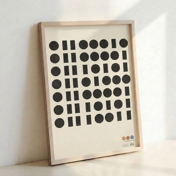 Contemporary geometric poster showcasing contemplative Bauhaus design with cream background and charcoal circular and rectangular forms.