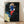 Pop art style portrait of Beethoven with bold, vibrant colors and high-contrast printing, framed as a poster on a wall.