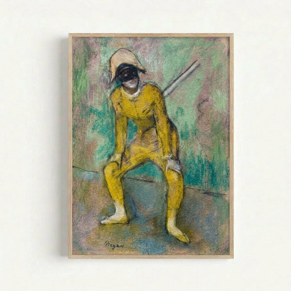 Vintage Degas ballet artwork showing a yellow-clad performer in elegant pose, displayed as a framed print with impressionistic brushwork and subdued palette.