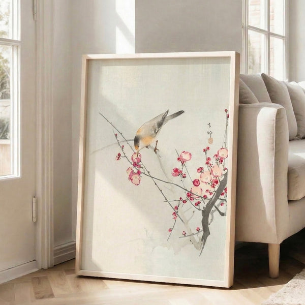 Contemplative watercolor artwork depicting a bird among delicate cherry blossoms in a minimalist composition featuring soft pink, cream, and muted charcoal tones.