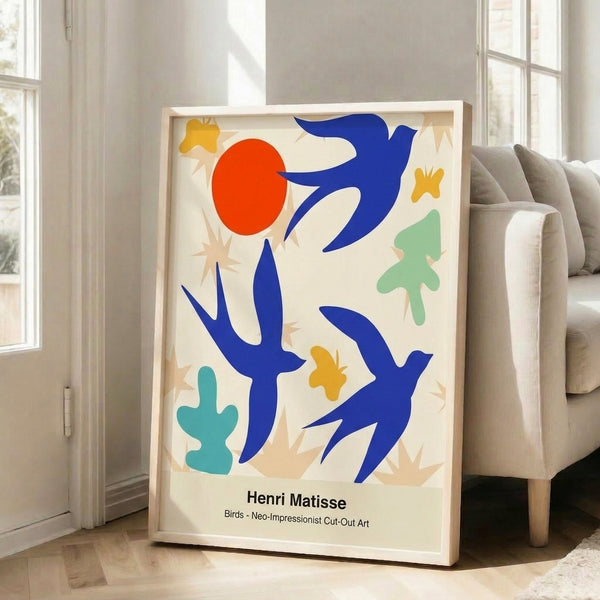Modern cut-out style wall art showcasing fluid bird forms in rich ochre, crimson, and blue with a vibrant, peaceful mood.