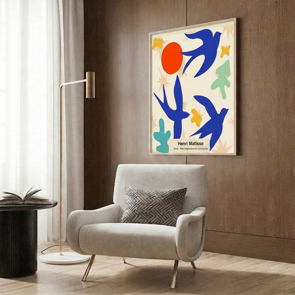 Contemporary framed art print of stylized birds in playful cut-out design, rendered in striking cobalt blue, green, and warm ochre tones.