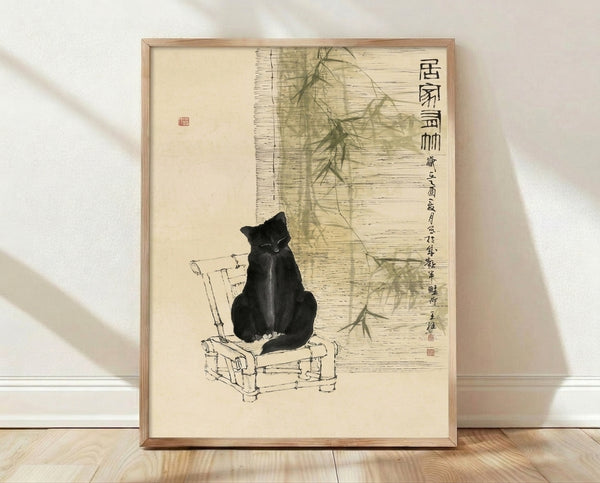 Framed Japanese ink wash painting featuring a black cat seated among bamboo stalks, rendered in minimalist line art style with cream and olive green accents.
