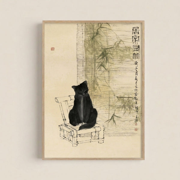Zen-inspired poster art displaying a contemplative black cat with bamboo plants in traditional Japanese woodblock aesthetic, mounted on a beige wall.