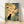 Serene Japanese woodblock-style framed poster featuring a black cat beside a bamboo lantern amid delicate flowers in cream, sage green, navy, and gold tones.
