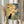 Zen-inspired poster art depicting a graceful black cat among bamboo elements and blooms in an understated composition of cream, sage green, and deep navy hues.