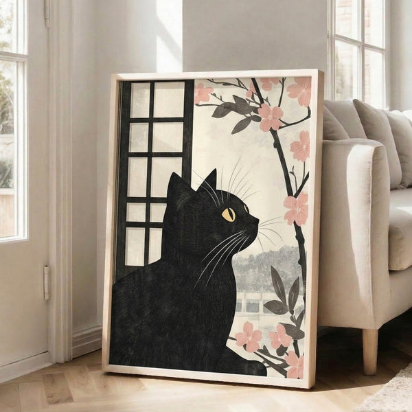Cozy elegance captured in line art: a black cat by a window with flowering cherry branches in muted pink and gray tones, displayed as a framed wall print.