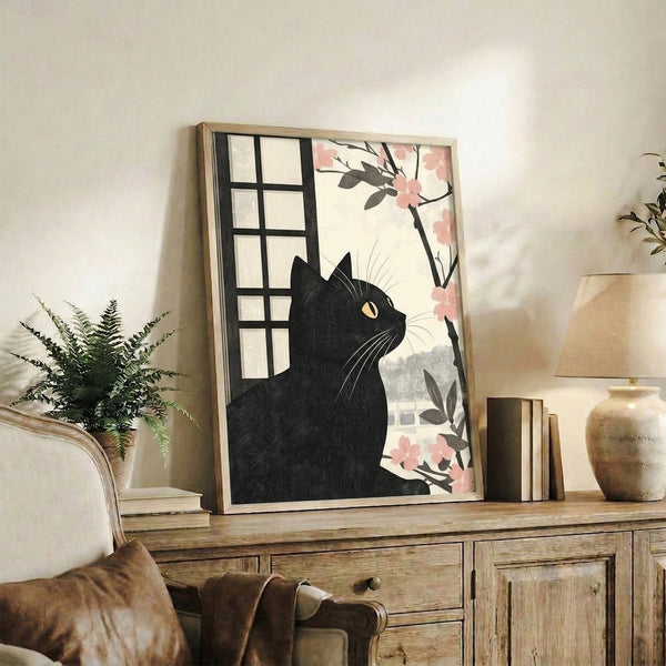 Serene Japandi wall art depicting a black cat observing cherry blossom branches through a window frame, executed in elegant black lines with soft pink and pale yellow accents.